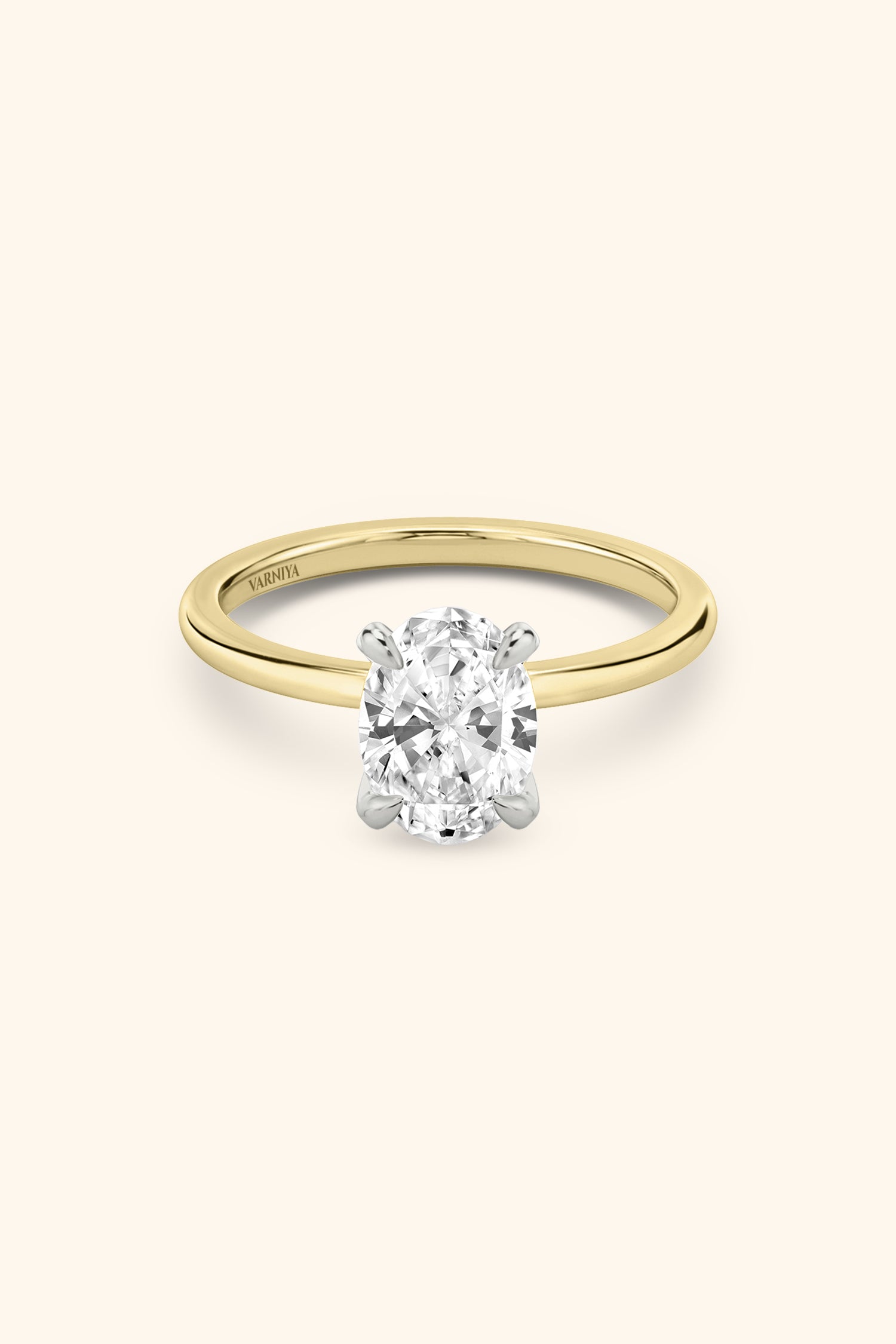 Dual Tone Glance Ring with an Oval Solitaire.