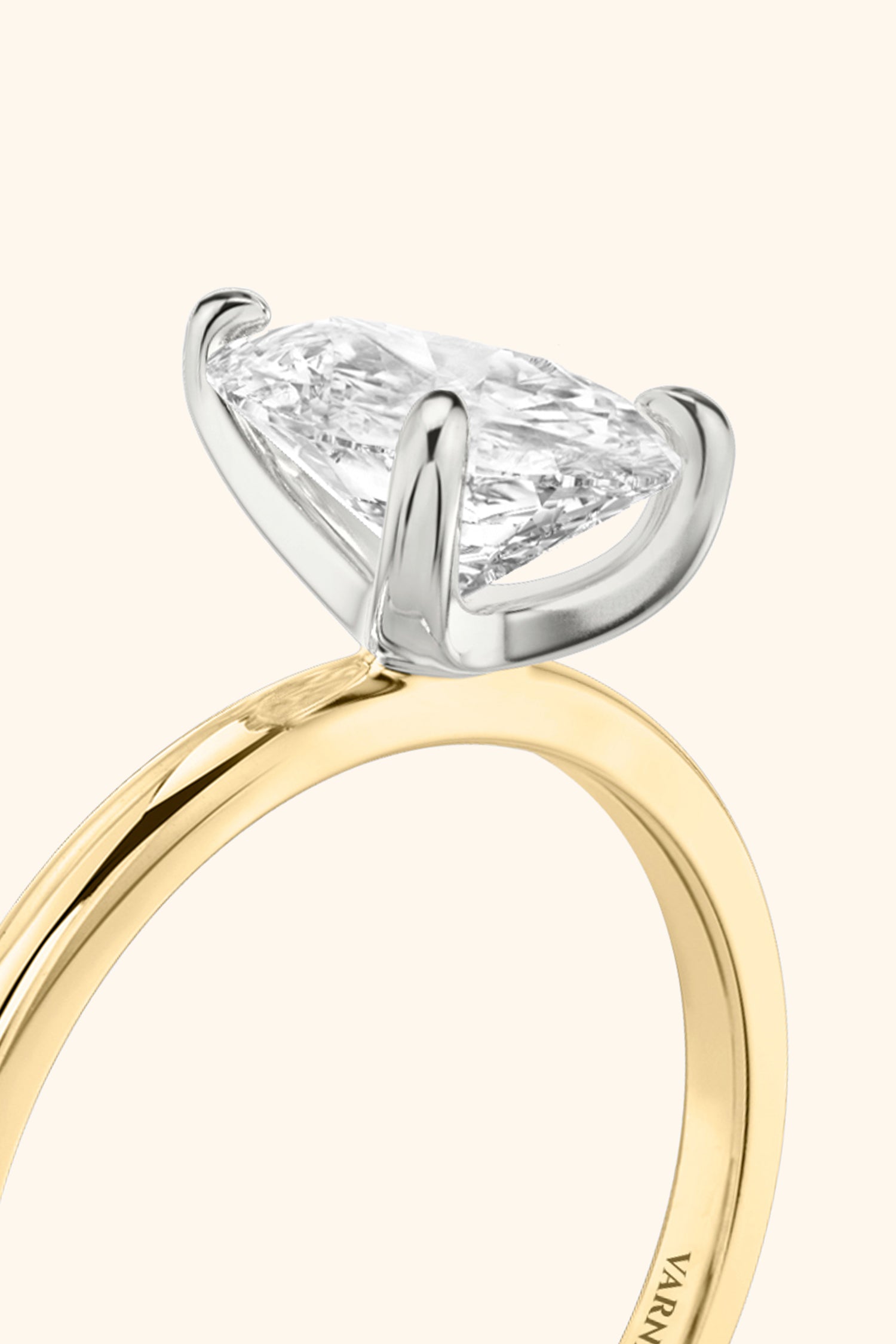 Dual Tone Glance Ring with Pear Solitaire.