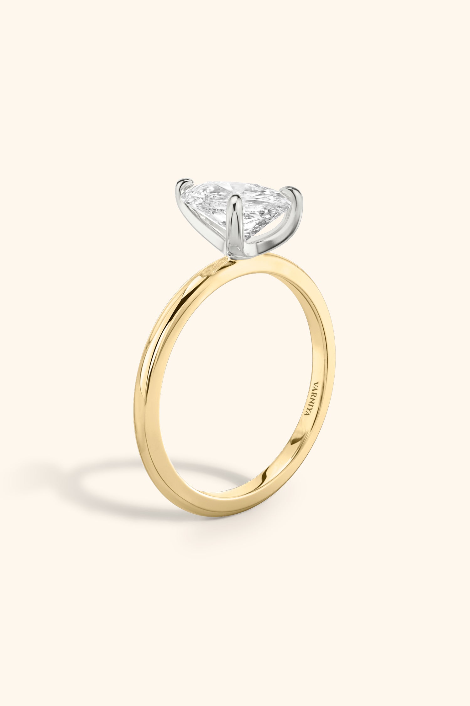 Dual Tone Glance Ring with Pear Solitaire.