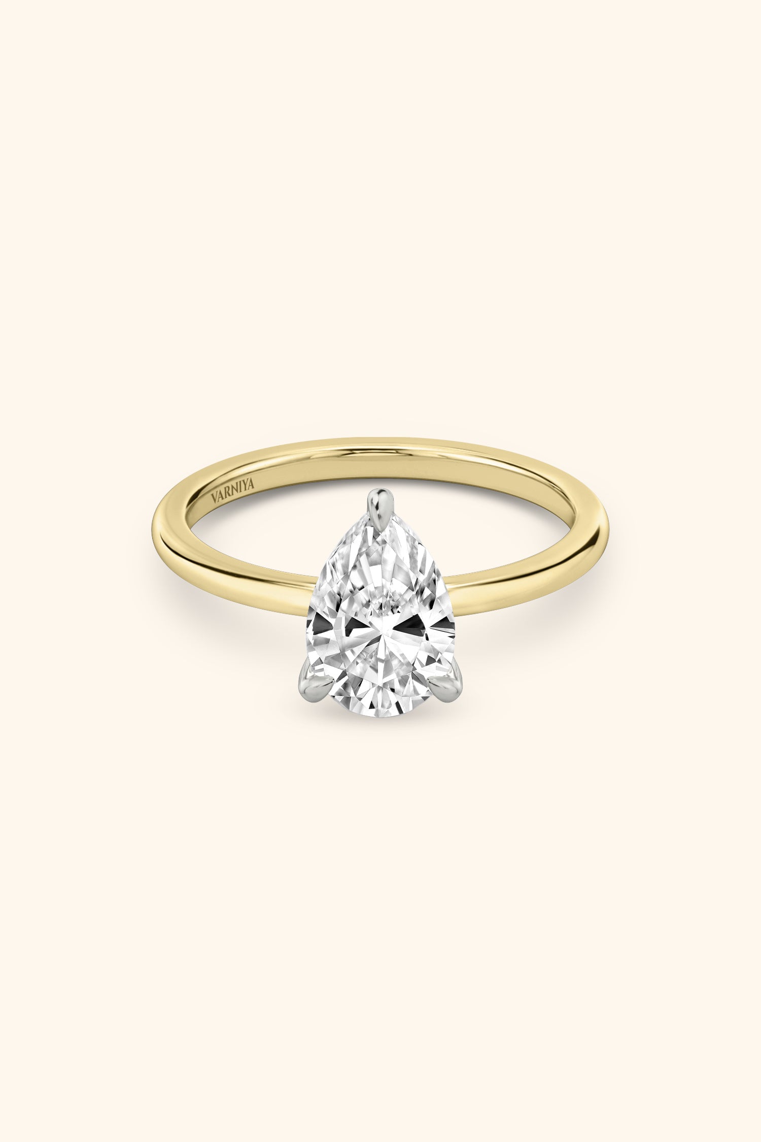 Dual Tone Glance Ring with Pear Solitaire.