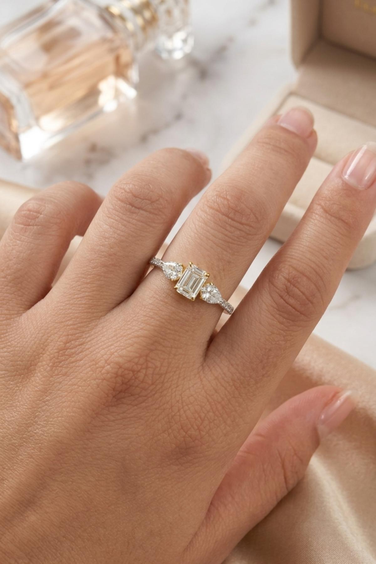 0.50Ct Trilogy Grace Emerald Solitaire Pavè Ring with Pear Side Stones in Ring Size 10